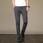 New Men's Casual Pants Autumn Winter Designer Solid Color Plus Size Slim Stretch Pants Men Loose Sweat Pants M~5XL AFK01